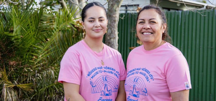 Two women wear pink shirts in support of Pink Shirt Day 2024.