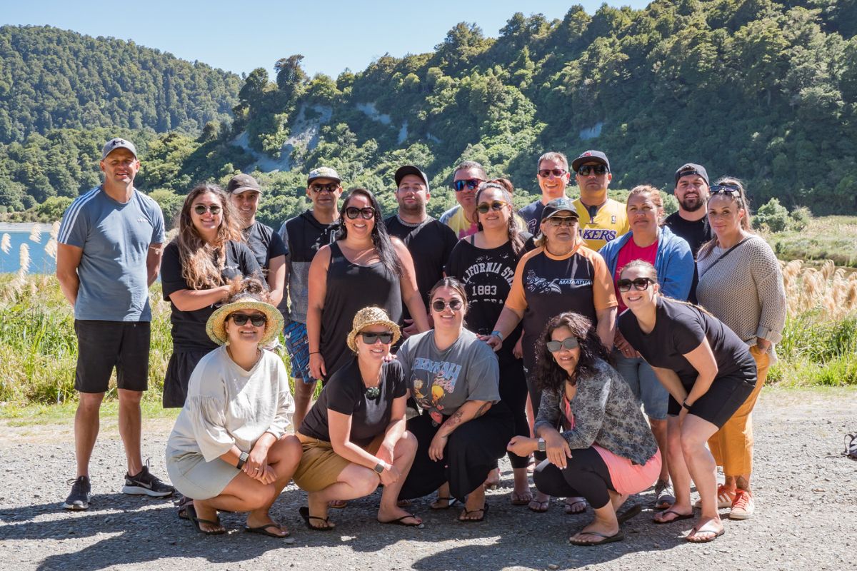 Group photo of kaimahi from Te Puna Ora o Mataatua representing Tāwharautia te āpōpō empathy endurance challenge